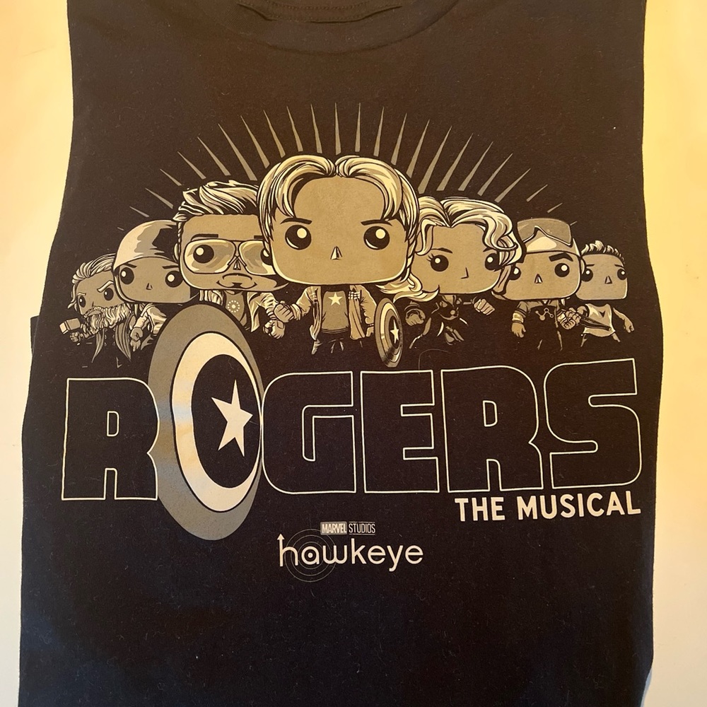 Marvel Roger’s the musical size. XL black with Hawkeye/ Ironman/Captain America